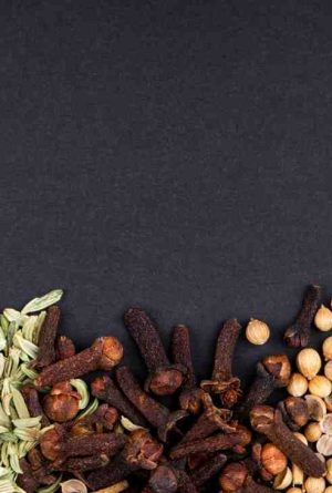 top-view-set-spices-herbs-peppercorns-anise-seeds-clove-black-background-with-copy-space-1